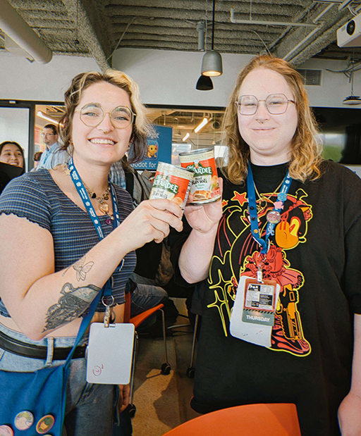 Yukon & Jen holding up cans of Chef Boyardee!
